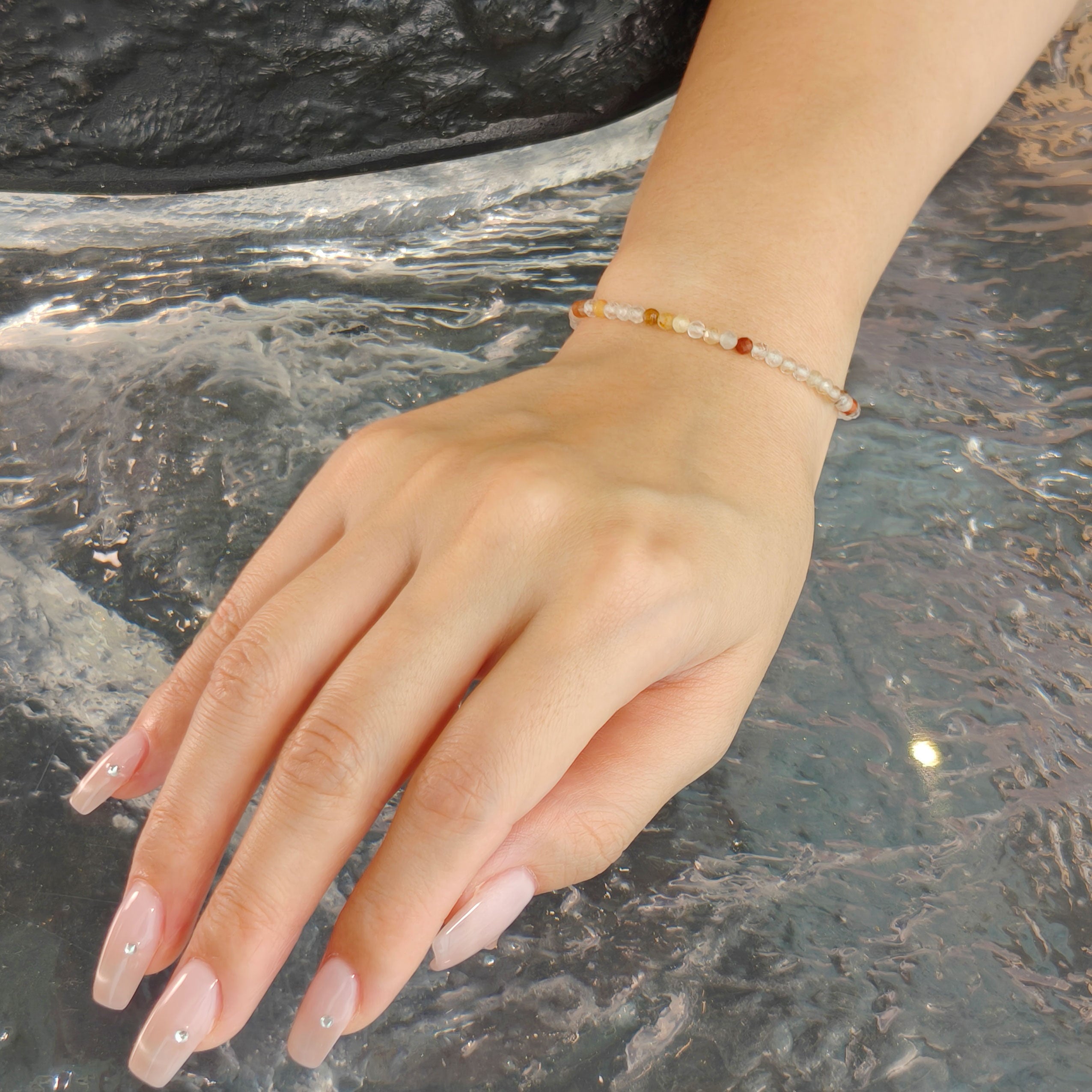 Etheris Multi-Color Rutilated Quartz Bracelet - Genuine Clear Crystal with Copper & Brown Rutile, a gemstone for prosperity and career success, inviting luck.