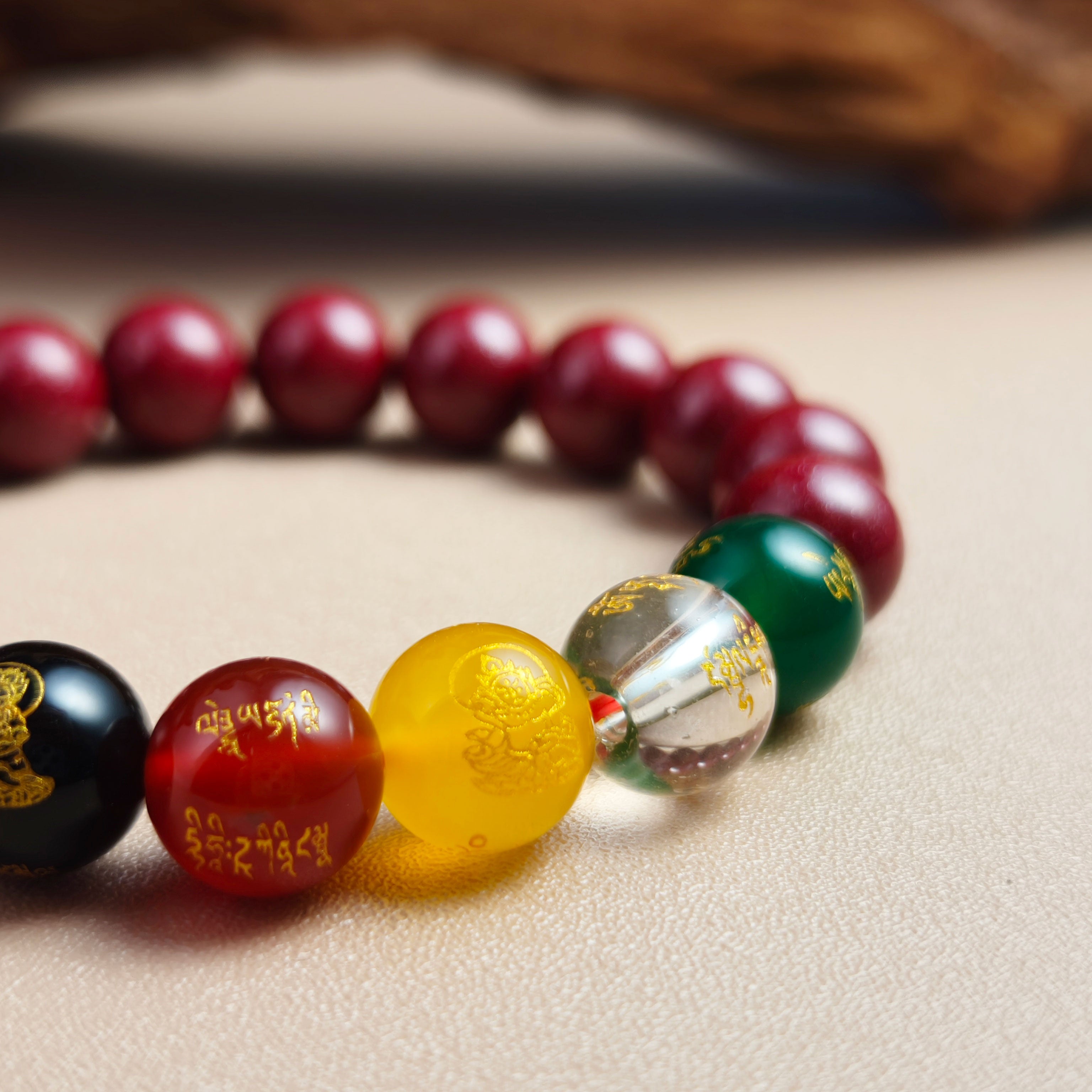 Etheris Authentic Cinnabar Agate Bracelet – Five Directions Gods of Wealth Blessing design, a natural stone for enhancing good luck, attracting wealth, and fostering positive energy flow.