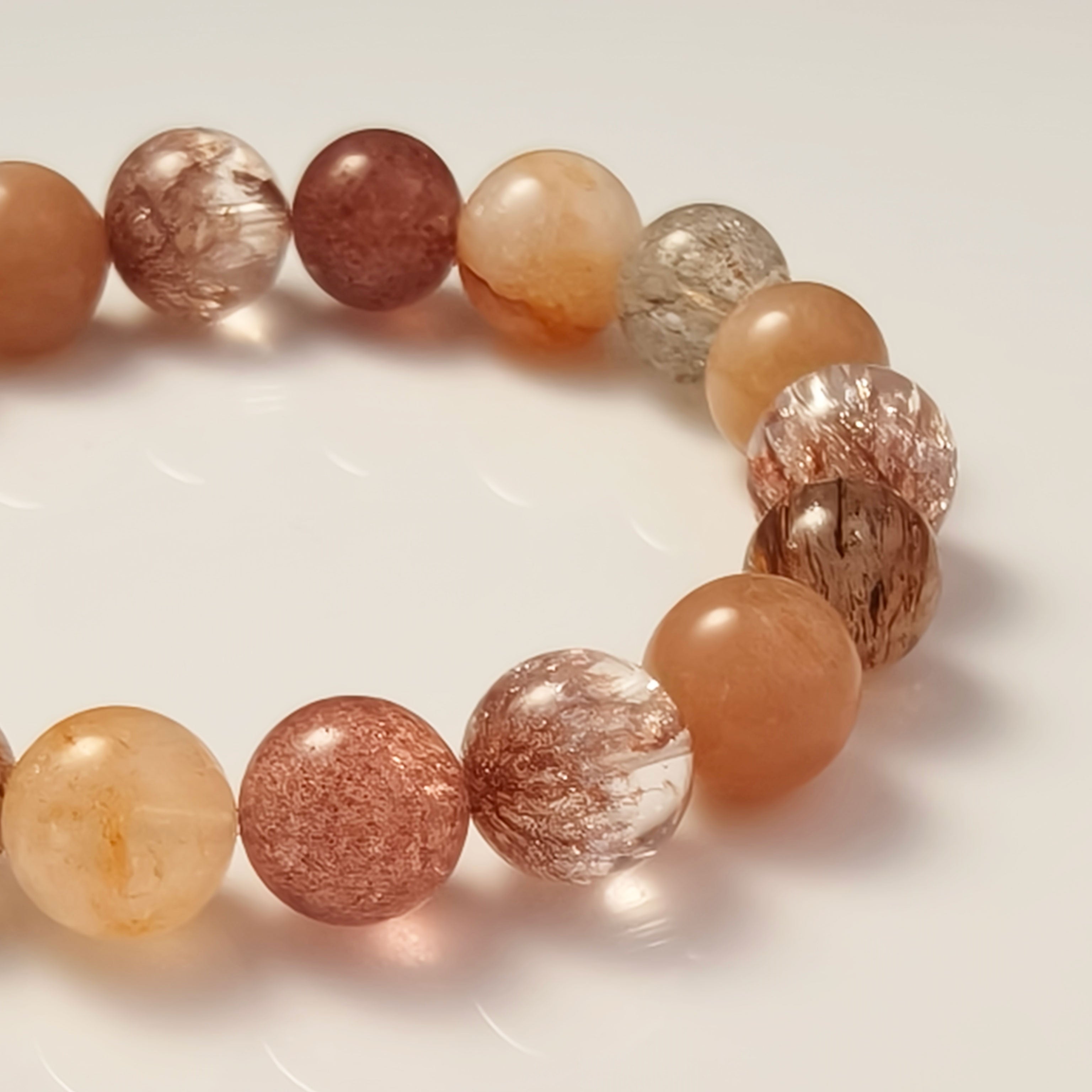 Etheris Hematoid (Fire) Quartz Beaded Bracelet - Polished natural gemstone, ideal for stress management, promoting peaceful sleep, and strengthening bonds of love and friendship.